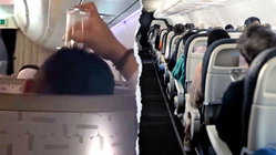 Passenger's bizarre use of drinking glass on flight leaves travelers horrified Architect Gold Coast